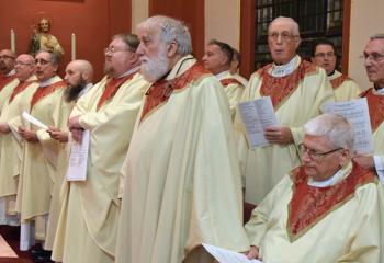 Diocesan priests leading and serving the parishes in the Schuylkill Deanery concelebrate Mass with the new Bishop.