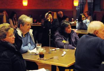 Listening to Father Stephen DeLacy at the evening session are, from left, Kitty Edgar of Bethlehem, Marie Kessler of Allentown, Leona Burke of Bethlehem and Michael Realo of Macungie.