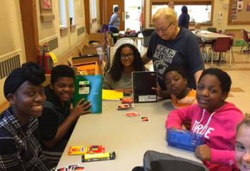 cutline 6 Students receive school bags and supplies donated by BB&T Bank and Whitehall Rotary. They also received a bag of health supplies from the Islamic Center of Whitehall. (Photo courtesy of Deacon Thomas Reimer)