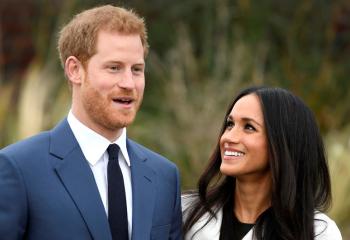 Britain's Prince Harry poses with Meghan Markle Nov. 27 in the Sunken Garden of Kensington Palace in London after announcing their engagement. Markle attended Immaculate Heart High School in Los Angeles. (CNS photo/Toby Melville, Reuters)