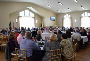 Parishioners enjoy brunch in the new parish hall.