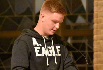 Andy Hess offers the First Reading during Evening Prayer reuniting participants of ‘Quo Vadis” at St. Mary, Kutztown.