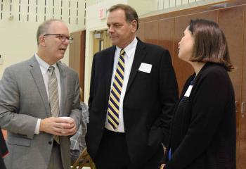 Paul Acampora, secretary of the Diocesan Secretariat for Stewardship and Development, enjoys conversation with Mark and Anne Kuna after Evening Prayer.