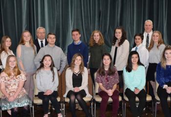 Winners in the “Stand Up for Life” essay contest and Diocesan officials are, from left: front, Chloe Palm-Rittle; Leah Wishard; Lauren Ferhat; Marissa Calantoni; Isabella Bautista; and  Kayla Corrado; back, Katherine Buerke; Mary Fran Hartigan; Caitlyn Kratzer; Shannon Dougherty; John Fitzpatrick, Fourth Degree Knights of Columbus and contest coordinator; Jonathan Bonomo; Andrew Hines; Katie Hawkins; Emily Carpenito; Joshua Tray; Dr. Philip Fromuth, superintendent of Catholic education; Bridget Ehrig; and P