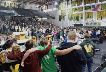 Students sing at the closing of Forty Hours.