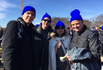 Members of the Assumption BVM group give a “thumbs up” for pro-life, from left, Andrew Sumner, John Temple, Bernadette Lamar and Tom Lamar. (Photo courtesy of Lisa Temple)