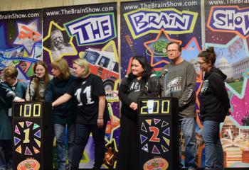 Teachers and staff from St. Francis Academy, Bally listening to a question during “The Brain Bowl” are, from left, Joan Kelsch, Jackie Youse, Margret Gehringer, Jennifer Smith, Maria Crail, Principal Deacon Thomas Murphy and Kathleen DiPietro. (Photo by John Simitz)