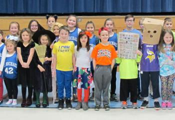 Elementary students from St. Michael the Archangel School, Coopersburg get ready to show off their talents and gifts before participating in the school’s Talent Show. (Photo courtesy of Marianne Gano)