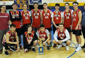 St. Thomas More, Allentown places second in the high school boys’ division of the CYO Basketball Championship Tournament Feb. 25 at Marian. From left are: front, John Kim, Ryan McDaid, Patrick Adams and Conner Wambold; back, head coach Matt Guensch, Francois D'Elia, Miles Wagner, James Haag, Zach Higgins, Sebastian Orzel, Nick Patruno, Harrison Ike and assistant coach Patrick McDaid.