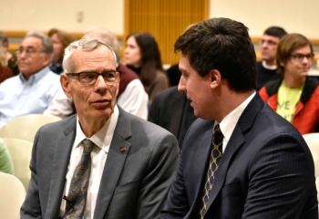 John Cavadini, left, chats with Nic Nanovic of the Notre Dame Club of the Lehigh Valley.