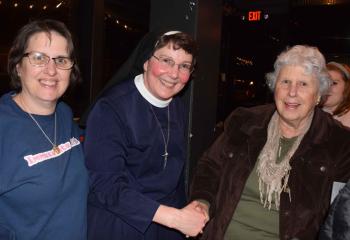 Sister Rose, center, reconnects with her former classmate, Sarah Amidon, parishioner of St. John Neumann, Lancaster, left, and friend, Gerri Frink from St. Ignatius Loyola, Sinking Spring. 