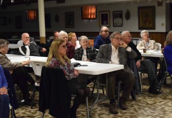 Serrans, front, from left, Shirley Heidecker, Beth Stehnach, Joe Bechtel, Jim Hammer and Carole Yeager join the rest of the group in listening to the morning presentations.