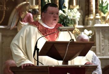 “We gather to celebrate Christ’s victory,” Father Martin Kern says during the homily.