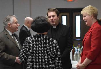 Father John Rother, assistant pastor of St. Catharine of Siena, thanks guests for supporting BAA and assisting the appeal in achieving its $5 million goal.