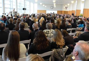 More than 600 faithful, supporters and clergy listen to Father Greenfield speak during the Mass of Missioning.