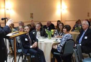 Bishop Alfred Schlert talks to the group. The theme of this year’s appeal is “Called to Serve.”