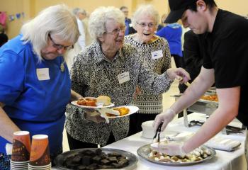 Enjoying food dishes at the kickoff the Bishop’s Annual Appeal (BAA) in Schuylkill County are, from left: Susan Klinger, Florence Strouphauer and Eugenia Jeppson. 