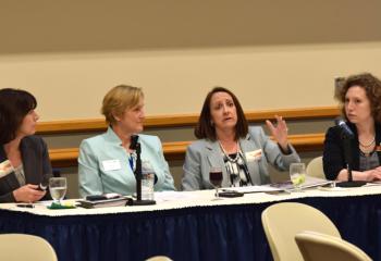 Beth Dobis Beers, third from left, makes a point as fellow panelists listen, from left, Sheri Leo, Denise Hozza and Claudia Wert.