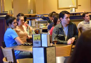 Young adults listen to the discussion “St. Ignatius Loyola and the Discernment of Spirits.”