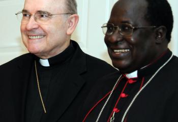 Bishop Emeritus Edward Cullen, then Bishop of Allentown, left, and Apostles of Jesus Archbishop Emmanuel Obbo of Tororo, Uganda and apostolic administrator of Soroti, Uganda, then Bishop of Soroti, converse during the celebration for the 40th anniversary of the AJs July 24, 2008 at Queenship of Mary, Northampton. (File photo)