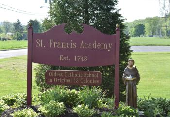 As part of St. Francis Academy’s 275th anniversary, a new sign was erected identifying it as the oldest school in the original 13 colonies.