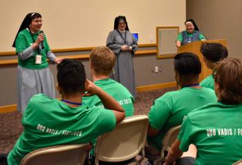 Speaking to Quo Vadis participants are, from left, IHM Sister Rose Bernadette Mulligan, Sister Servants of the Most Sacred Heart of Jesus (SSCJ) Sister Mary Jo Calore and Missionary Sisters of the Most Sacred Heart of Jesus (MSC) Sister Lisa Valentini. The sisters spoke during a question and answer panel discussion so the boys can ask the sisters questions about their life and vocation.