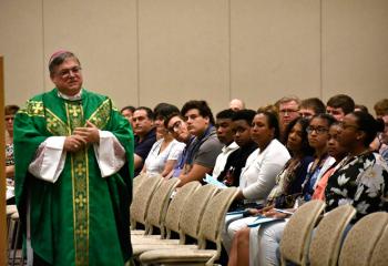 Bishop Alfred Schlert welcomes participants and their families to Quo Vadis and Fiat Days vocation camps as celebrant of the opening liturgy July 15 in Connolly Chapel at DeSales University, Center Valley. 