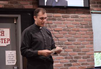 Father Arechabala reads a letter he wrote to God when he was 12 years old. “I asked him to help me be who I should be. That simple way to address God is how we always should do it.”