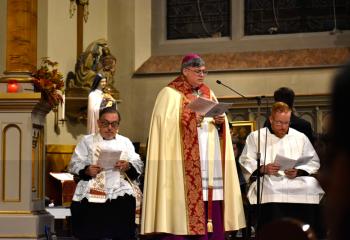 Bishop Schlert, center, offers the opening dialogue with Father David Kozak, left, pastor, and Father Mark Searles, right, director of the Office for Vocations Promotion and chaplain at Allentown Central Catholic High School.