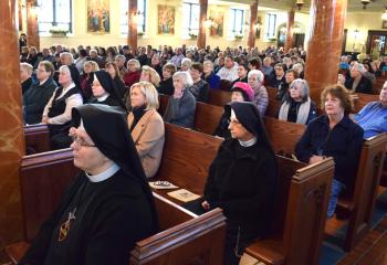 Women religious and others gather for Father Walter Ciszek Day to recall his steadfastness to the Gospel during captivity in the Soviet Union.