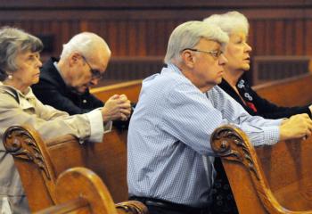 Eugene and Frances Yacapsin, left, and Hugh and Maggie Dugan during the Holy Hour at Immaculate Conception, Jim Thorpe (Photo by Ed Koskey )