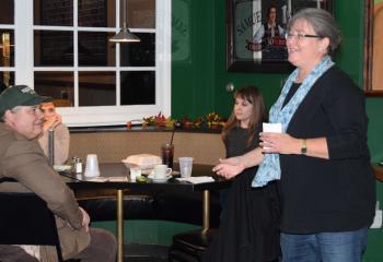 Listening to Gontis speak are, from left: her husband Jim Gontis, director of Evangelization and Catechesis and Sports Ministry, Diocese of Harrisburg; Lauren Wagner, parishioner of the Cathedral of St. Catharine of Siena, Allentown; and Alexa Smith.