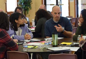 Participating in group discussion are, from left, Monica Gutman, Joey Moser (hidden), Christina (Tina) Tran, Bob Michener, Jenn Reasinger and Francesca Frias.