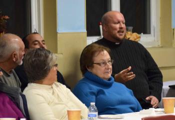 Father Allen Hoffa, pastor of St. Joseph, Summit Hill and rector of the shrine, participates in the discussion.