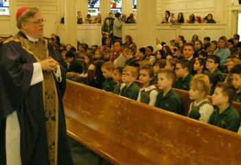 Bishop Schlert offers the homily for school students inside the former main church of St. Jane, where he celebrated his first Mass after being ordained to the priesthood