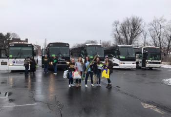 Students prepare to board the buses from Allentown Central Catholic High School. from left, Elizabeth Ulicny, Kelsey Rodowicz, Isabella Joyce, Abigail McMullen and Mackenzie Lambinus. In the background are, from left, Renee Serencsits, Sisters of Christian Charity (SCC) Sister Sophia Marie Peralta, Matt Garza and Charlie Carbonetto. (Photo courtesy of Father Mark Searles)