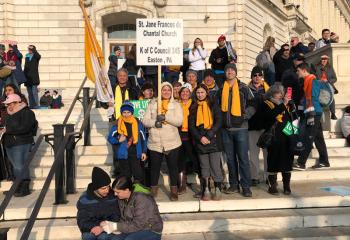 The group from St. Jane Frances de Chantal gathers on the Senate steps at the Russell Building. (Photo courtesy of Andrew Azan)