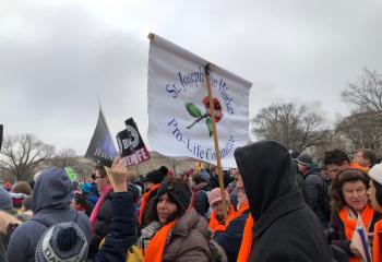 Members of the group from St. Joseph the Worker march to defend life. (Photo courtesy of Mary Fran Hartigan)
