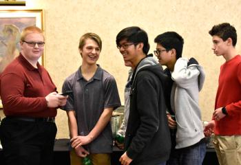 Boys who have attended Quo Vadis enjoy the lunch.