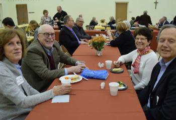 Stewards mingling during the reception are, from left: Patricia and Deacon Howard Schultz, parishioners of St. Peter the Apostle, Reading; and Patricia and Patrick Holland, parishioners of Holy Guardian Angels, Reading.