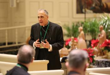 Cardinal Daniel N. DiNardo of Galveston-Houston, president of the U.S. Conference of Catholic Bishops, speaks at the conclusion of a prayer service in the Chapel of the Immaculate Conception at Mundelein Seminary Jan. 2 at the University of St. Mary of the Lake in Illinois, near Chicago. (CNS photo/Bob Roller)