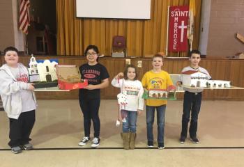 Students from St. Ambrose School (SAS), Schuylkill Haven display their California Missions projects Feb. 4 Vocations Day, which was postponed during CSW due to inclement weather. From left are Ethan Donatti, Lynn Nguyen, Nicole Frompovicz, Pierce Lithow and Tyler Buchman. (Photo courtesy of SAS)