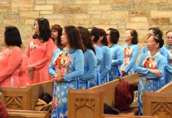Vietnamese women participate in Mass in observance of the Lunar New Year.
