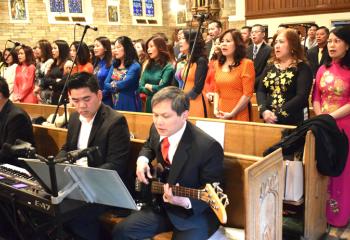The choir sings a traditional Vietnamese hymn.