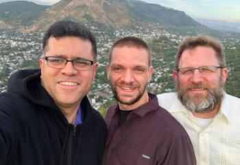 Father Garcia, Father Ganser and Father Laskowski overlooking the city of El Salvador.