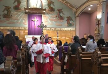 Procession at the end of Ash Wednesday 9 a.m. Mass at Sacred Heart of Jesus parish, Allentown