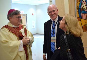 Bishop Schlert greets John Morahan, CEO and President of Penn State Health St. Joseph, and his wife, Anne Morahan. Bishop Schlert expressed gratitude to Morahan; Susan Sullivan, vice president of Mission and Ministry; and the entire administrative team for their dedicated leadership in ensuring the Catholic identity and mission of the hospital. He thanked his brother priests, deacons and dedicated religious sisters for their pastoral service that they show to the patients and staff.