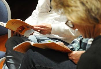 Parishioners at Holy Family, Nazareth focus on an activity during part of the meeting. The structure of the meetings includes Introductions, Focus, Opening Song, Opening Prayer, A Survivor’s Story and Reflection, The Word of God, Reflection, Act, and Closing Prayer. (Photo by Ed Koskey)