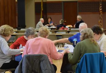 Parishioners of the Cathedral of St. Catharine of Siena, Allentown gather for a Wednesday night meeting in the Parish Activity Center. Training of facilitators was done by Renew International, the Catholic nonprofit organization asked by Bishop Schlert to design the “Healing Our Church” program. (Photo by John Simitz)