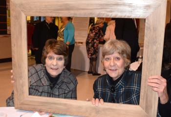 Gerry Wernicki, left, and Christine Earl, parishioners of St. Ignatius, enjoy the reception at the BAA kickoff.